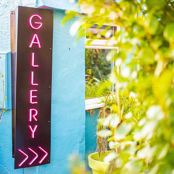 Close up of 'Gallery' sign at Café Nucleus Chatham