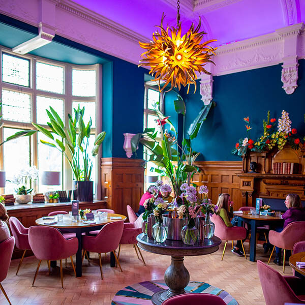 Interior view of the Café Nucleus Boardroom with centrepiece and Urchin chandelier
