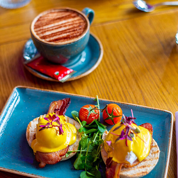 Eggs Benedict and hot drink